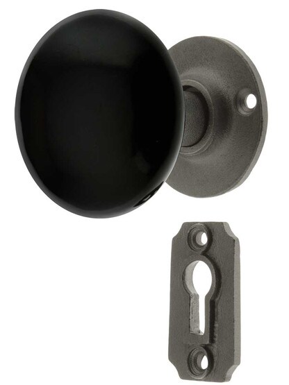 Iron Rosette Mortise Lock Set With Jet Black Porcelain Knobs in Antique Iron.
